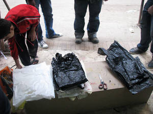 abdu preparing plastic bags